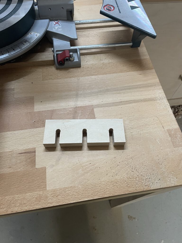 Halter für Holzpfeilen
